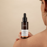 Skin Generics Tanbest® DHA TAN DROPS Natural Self-Tanning Ultra Concentrate lady holding